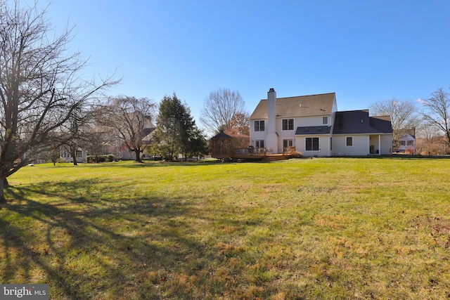 view of yard featuring a deck