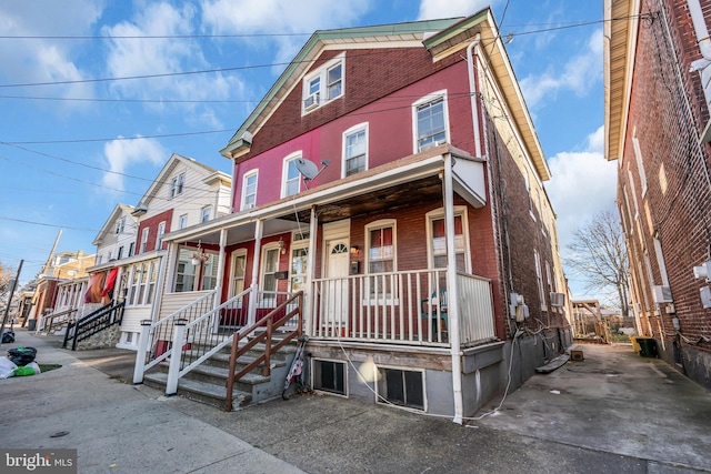 view of front of home featuring covered porch