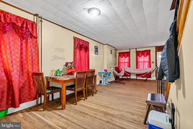 dining space featuring light wood-type flooring