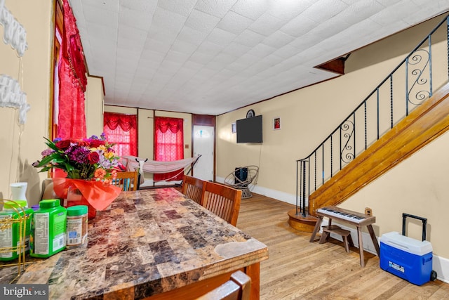 47 Liberty St, Trenton, NJ 08611 - dining area with wood finished floors and stairway