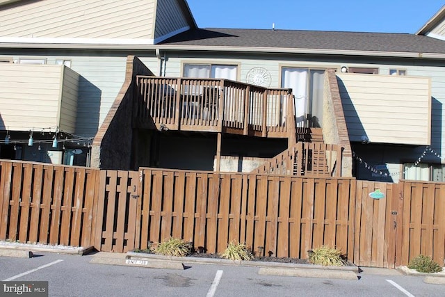 108 120th St Unit 39, Ocean City, MD 21842 - view of front facade featuring a fenced front yard, stairway, and a deck