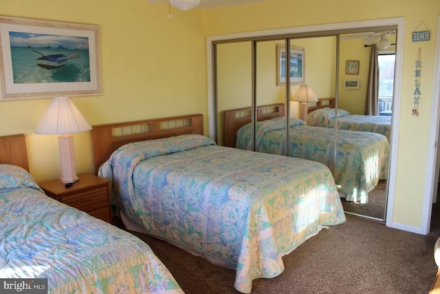 bedroom with a closet and carpet floors