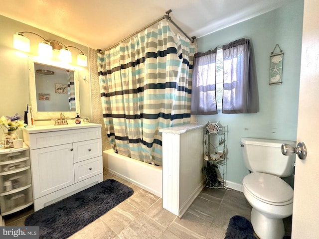 full bathroom with shower / tub combo, vanity, and toilet