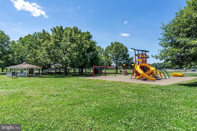 view of jungle gym featuring a gazebo and a lawn