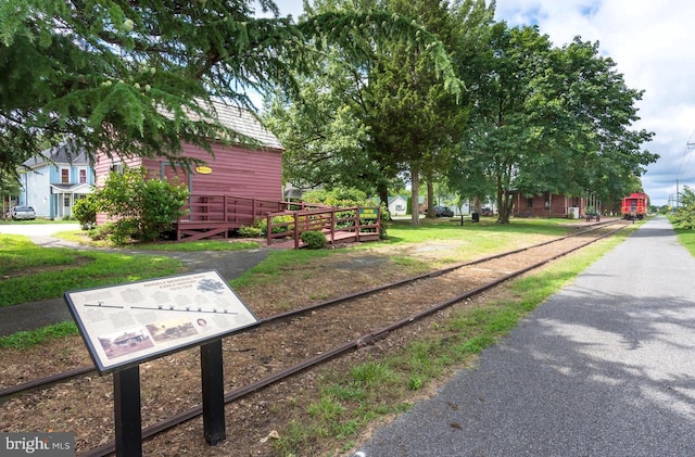 view of property's community with a wooden deck