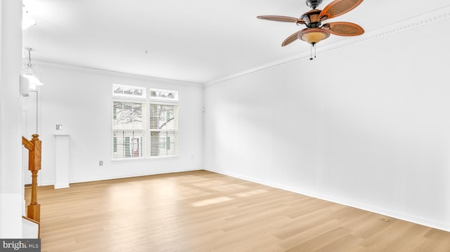 interior space with crown molding, light hardwood / wood-style floors, and ceiling fan