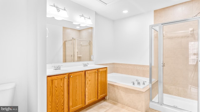 bathroom with tile patterned floors, plus walk in shower, and vanity