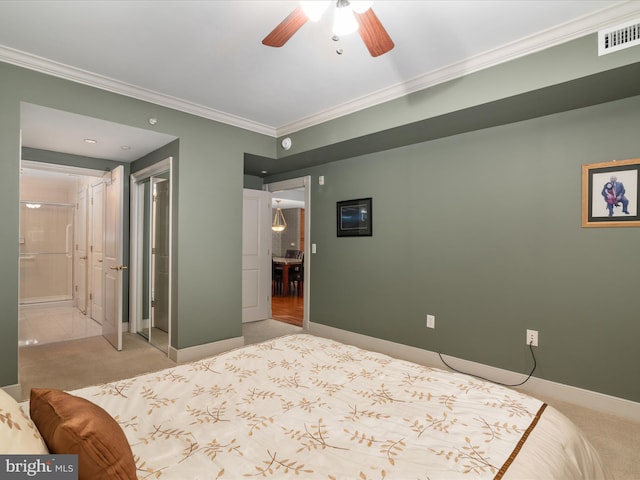 bedroom featuring light carpet, ceiling fan, ensuite bathroom, and ornamental molding