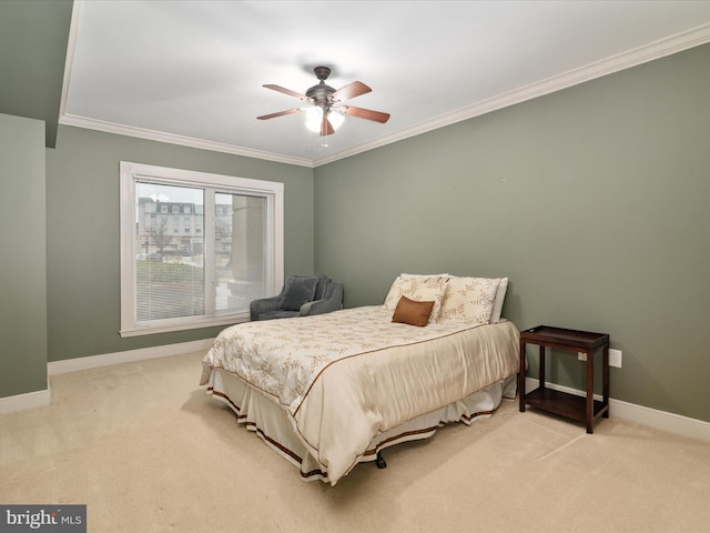 5 Park Pl Unit 102, Annapolis, MD 21401 - bedroom with light colored carpet, crown molding, and ceiling fan