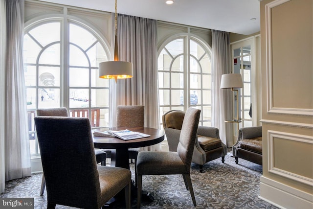 dining space with plenty of natural light