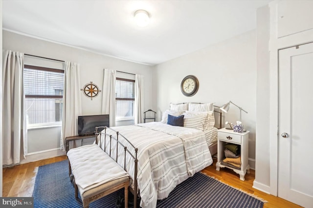 bedroom with light hardwood / wood-style floors