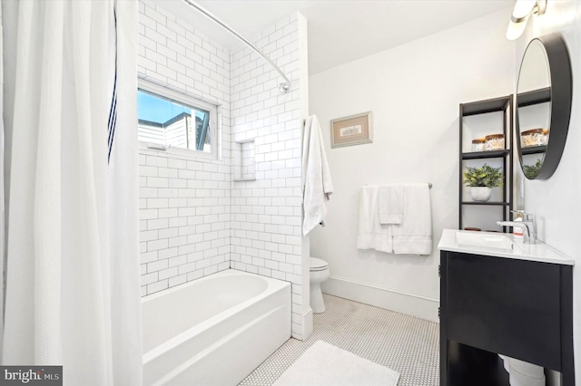 full bathroom with tile patterned floors, shower / bath combo with shower curtain, vanity, and toilet