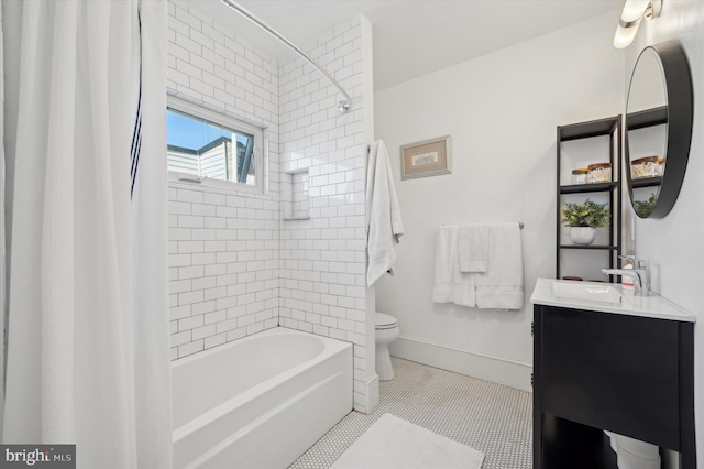 full bathroom with tile patterned flooring, shower / tub combo, vanity, and toilet