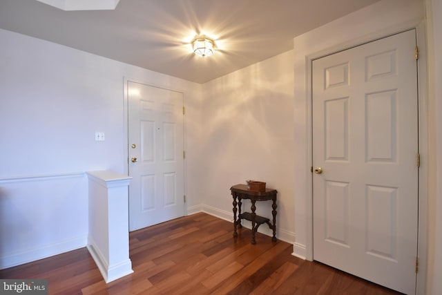 entrance foyer featuring dark hardwood / wood-style flooring