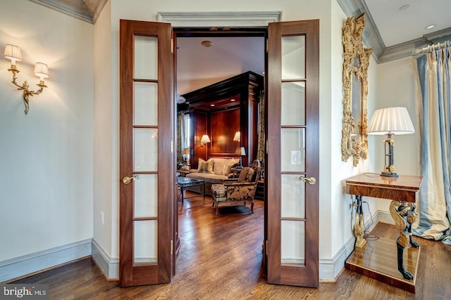 hallway featuring crown molding, french doors, and hardwood / wood-style flooring