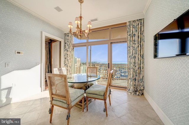 dining area featuring a notable chandelier and ornamental molding