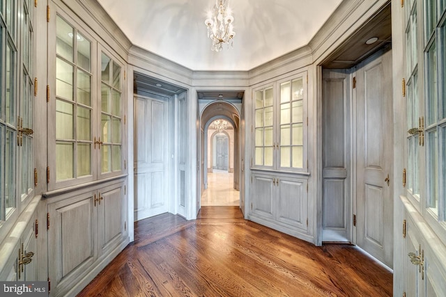 entryway with a chandelier and hardwood / wood-style flooring