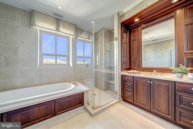 bathroom featuring vanity, crown molding, and plus walk in shower