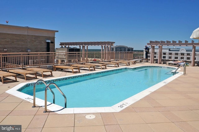 view of pool featuring a pergola and a patio area