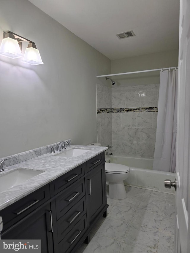 full bathroom with vanity, toilet, and shower / bath combo with shower curtain