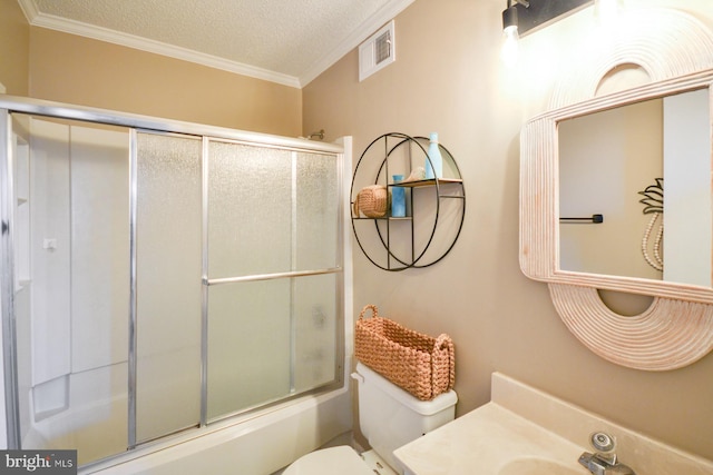 119 Old Landing Rd Unit 204J, Ocean City, MD 21842 - bathroom with toilet, ornamental molding, combined bath / shower with glass door, vanity, and a textured ceiling