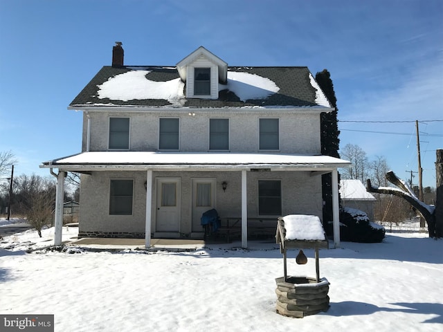 view of front of home featuring covered porch