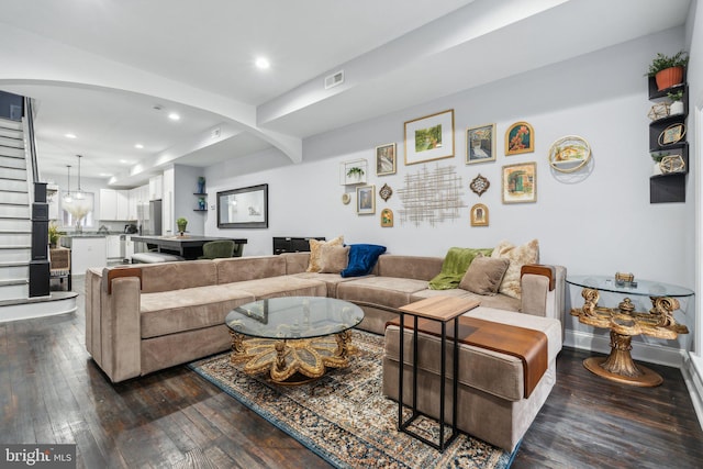 living room featuring dark hardwood / wood-style floors