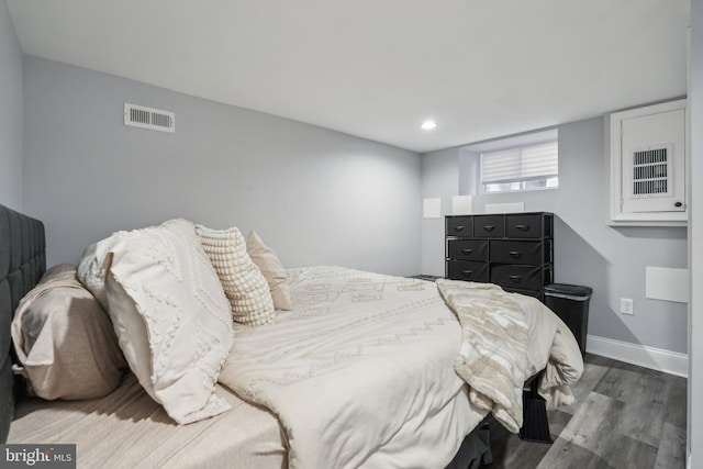 bedroom featuring dark hardwood / wood-style floors