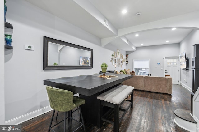 dining room featuring dark hardwood / wood-style flooring