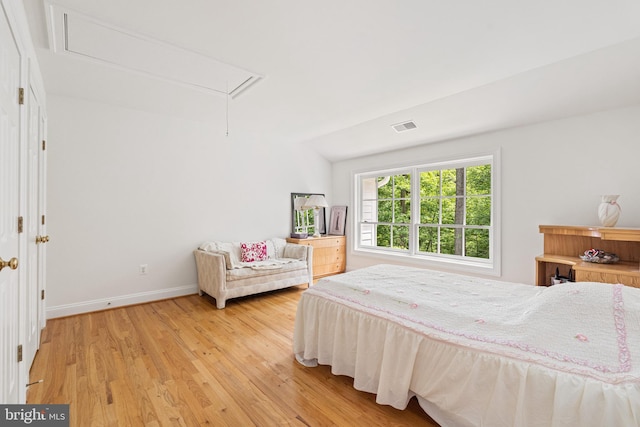 bedroom featuring hardwood / wood-style flooring