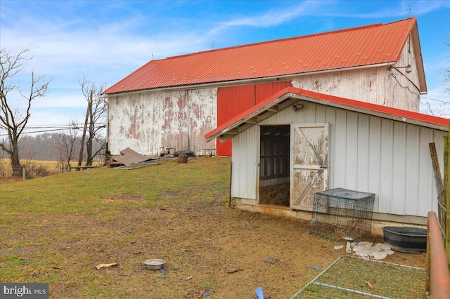 exterior space with a shed and a yard