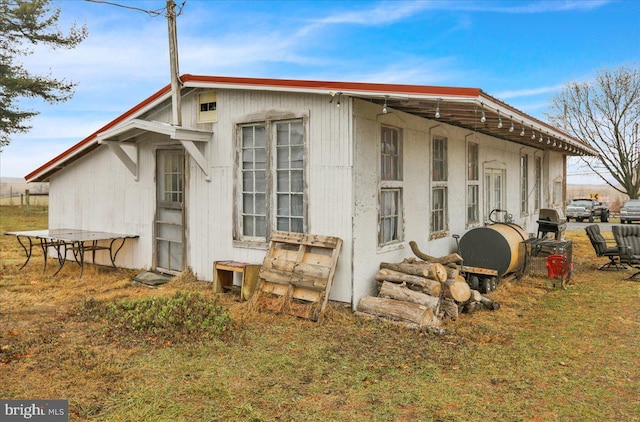 view of home's exterior featuring a yard