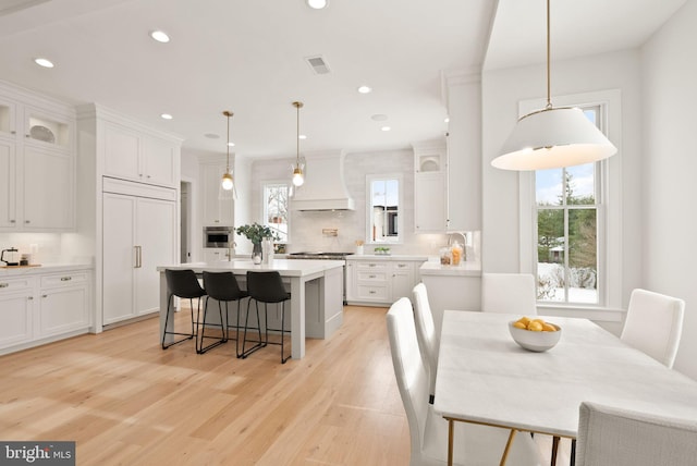 dining room featuring light hardwood / wood-style flooring