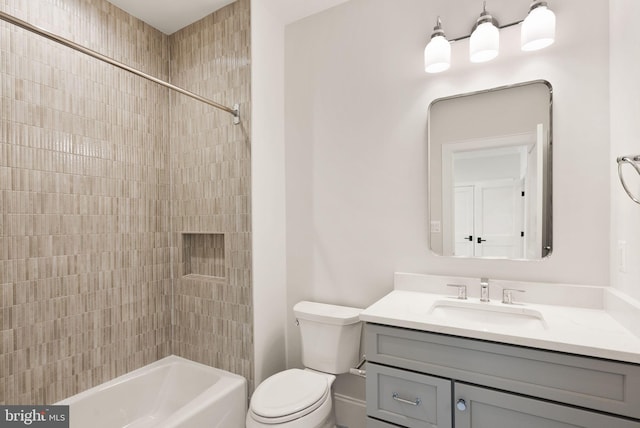 full bathroom featuring shower / washtub combination, vanity, and toilet