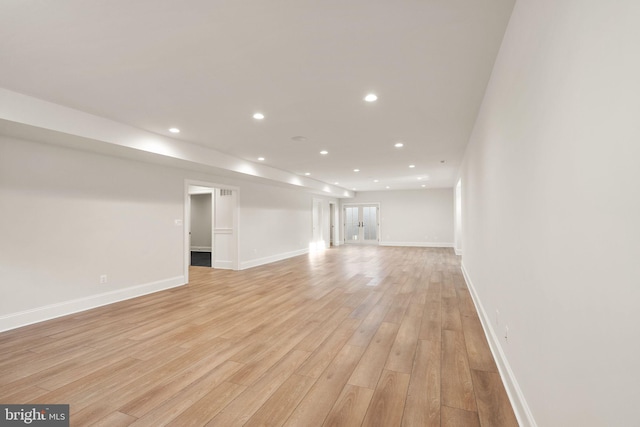 unfurnished living room featuring light wood-type flooring