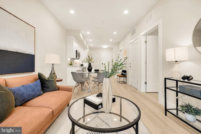 living room featuring light hardwood / wood-style flooring