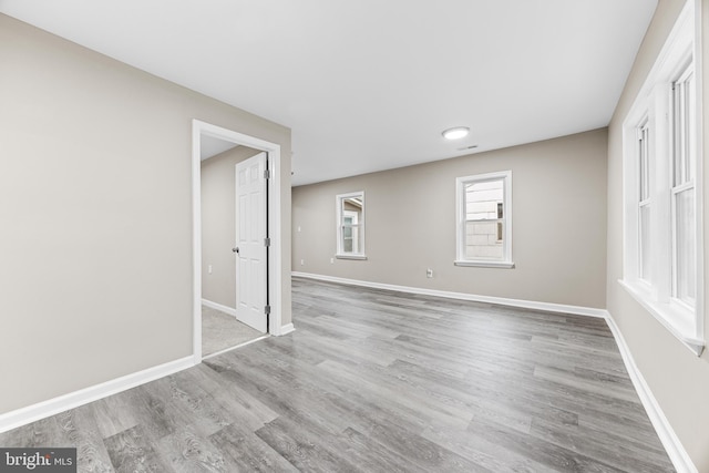 unfurnished room featuring light hardwood / wood-style flooring