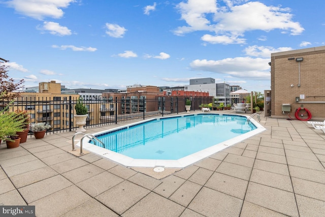 2201 L St NW Unit 906, Washington, DC 20037 - community pool featuring a patio area and fence