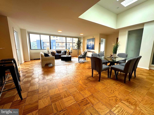 2201 L St NW Unit 906, Washington, DC 20037 - dining room with baseboards, a skylight, and recessed lighting