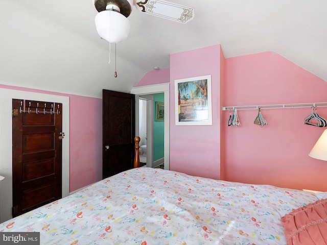 bedroom featuring ceiling fan and lofted ceiling