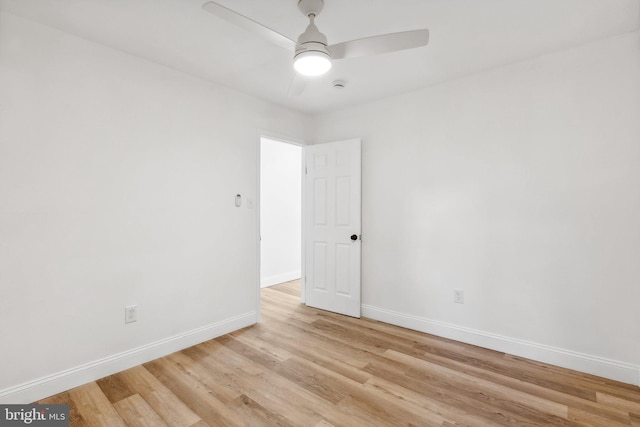 unfurnished room with light hardwood / wood-style flooring and ceiling fan