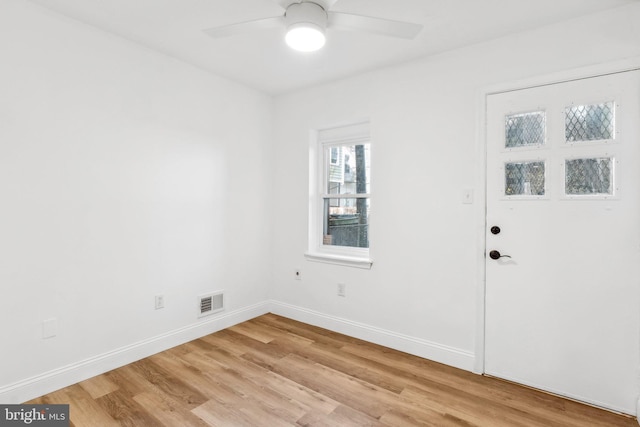 interior space with ceiling fan and light wood-type flooring