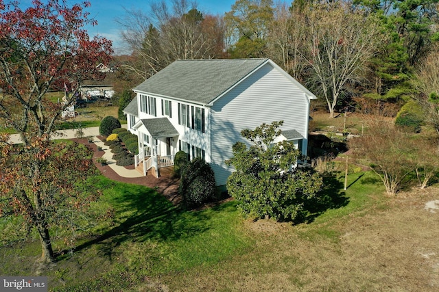 exterior space featuring a lawn