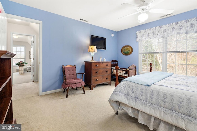 carpeted bedroom with ceiling fan