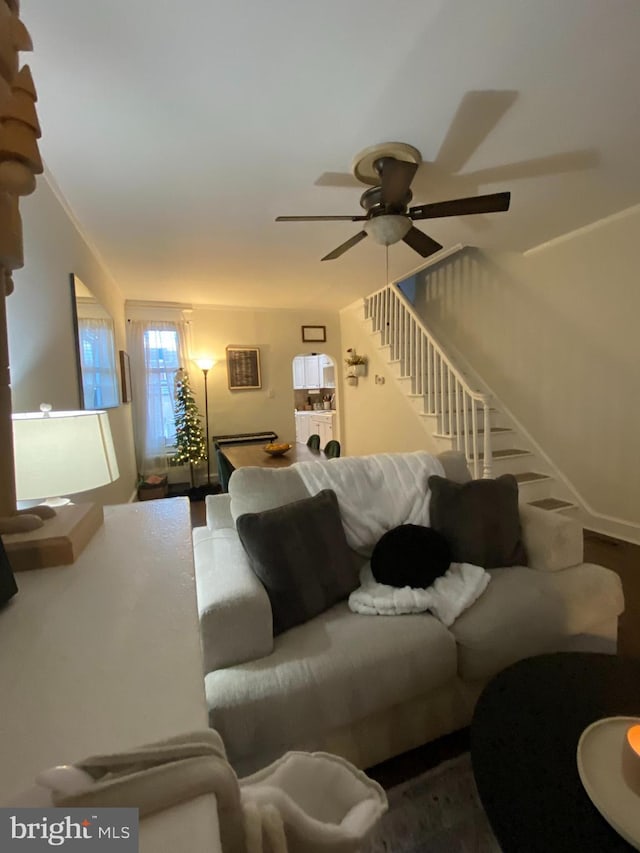 living room featuring ceiling fan