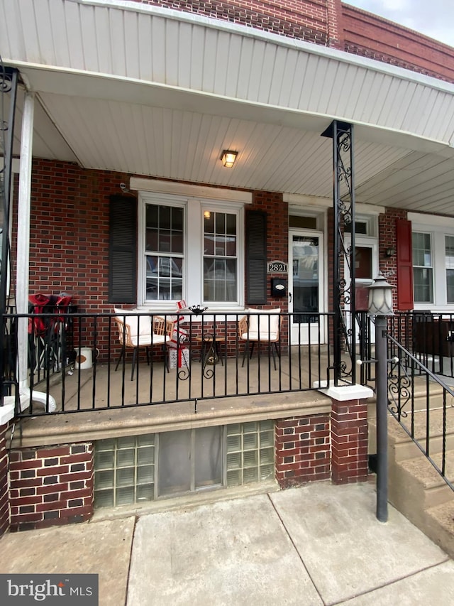 entrance to property with covered porch