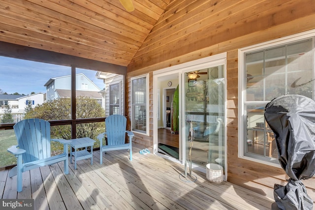 sunroom / solarium with wood ceiling and vaulted ceiling