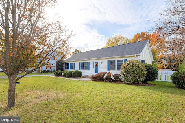 view of front of property with a front lawn