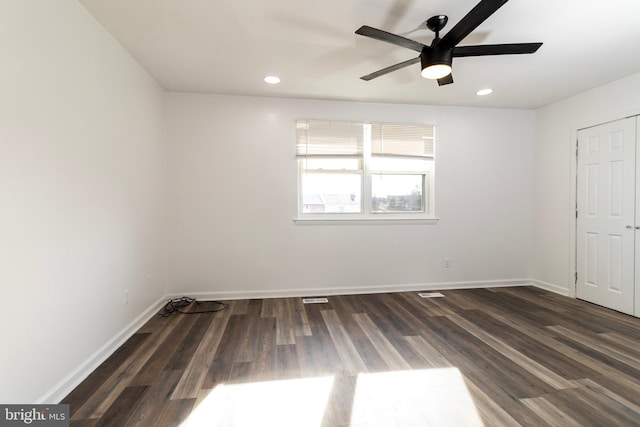 unfurnished bedroom with dark hardwood / wood-style floors and ceiling fan