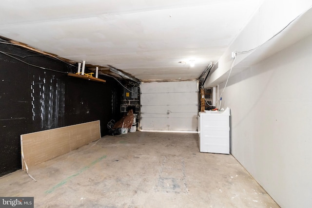 garage featuring washer / clothes dryer